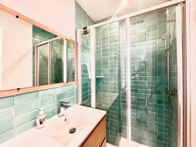 a bathroom with a sink and a shower at Copacabana beach, by Welcome to Cannes in Cannes