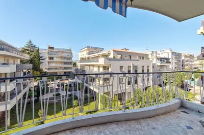 a balcony with a view of some buildings at Appartement le San Francisco bright and calm 3 bedroom flat in Cannes