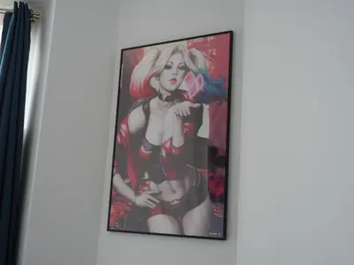 a painting of a woman on a wall at Le QG - CANNES - Palais du Festival in Cannes