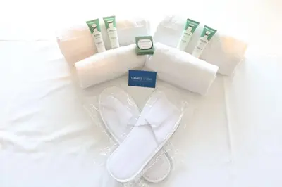 a display of toothbrushes and towels on a bed at Quality 1 bedroom rue du Canada 5 mins Croisette 208 in Cannes