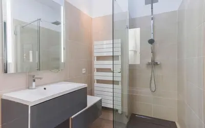 a bathroom with a sink and a shower at Loft Meynadier by Halldis in Cannes