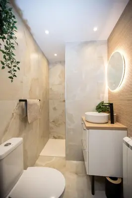 a bathroom with a white toilet and a sink at Jungle Room Jacuzzi Privé Évasion en amoureux in Cannes