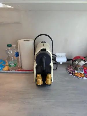 a coffee maker is sitting on the floor at Appartement - Cannes vieille ville - Le Suquet in Cannes