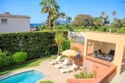 an aerial view of a house with a swimming pool at Villa Cynthia - Piscine - Plage (à 50m) - Palais Congrès - Calme absolu in Cannes