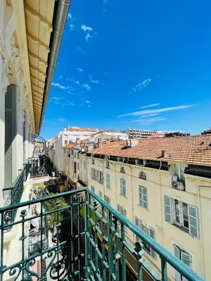 a view from a balcony of buildings at cote sud deux chambres proche croisette in Cannes