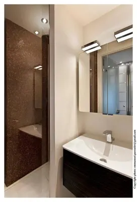 a bathroom with a sink and a mirror and a shower at REF 761 - Cannes Croisette - Sea view apartment for rent in Cannes