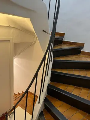 a set of stairs in a house at Hé Jude le Suquet in Cannes