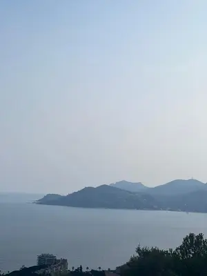 a view of a large body of water with mountains at Cannes Villa Francia in Cannes