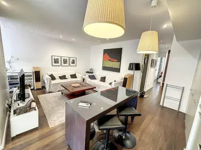 a living room with a couch and a table at GAB1 - 3 pièces au cœur du centre ville in Cannes