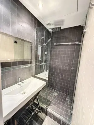 a bathroom with a sink and a shower at GAB1 - 3 pièces au cœur du centre ville in Cannes