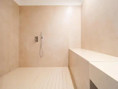 a bathroom with a shower with a hose in it at Appartements proche Croisette, Casino, plages, centre ville et Gare in Cannes