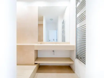 a bathroom with a sink and a mirror at Appartements proche Croisette, Casino, plages, centre ville et Gare in Cannes
