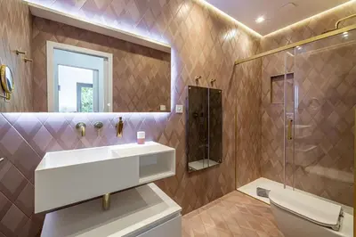 a bathroom with a sink and a shower and a toilet at Luxurious Villa with heated pool 6BR-12p - Cannes in Cannes
