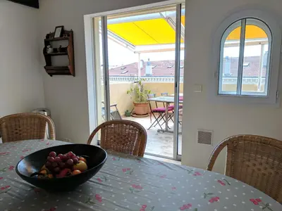 a bowl of fruit sitting on top of a table at Citilet 4 Duplex, funky with large terrace in Cannes