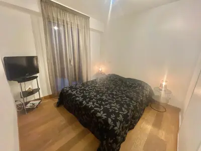a living room with a couch and a table at Vieux Port One Bedroom Apartment A05 in Cannes