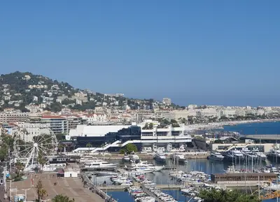 a view of a harbor with boats in the water at Bel Appartement Typique proche du Palais et Plages in Cannes