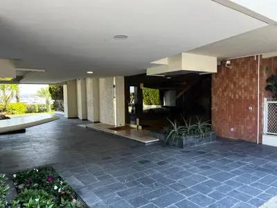 a lobby of a building with a brick wall at Les yeux dans le bleu, Cannes Vue mer in Cannes