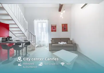 a living room with a couch and a table at Hypercentre - Palais - Croisette - Suquet - AY in Cannes