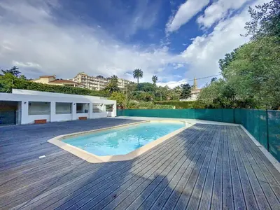 a swimming pool on the deck of a house at Cannes - Basse Californie - 3 pièces in Cannes