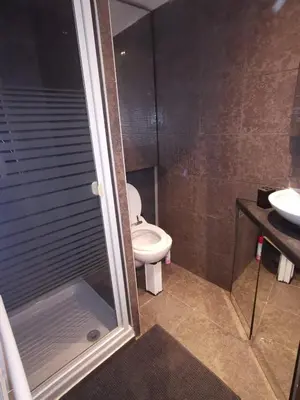 a bathroom with a toilet and a sink at Duplex 3 pièces 4 couchages au Suquet à 2 mn à pied du port de Cannes, du centre, de la mer et du palais des festival in Cannes