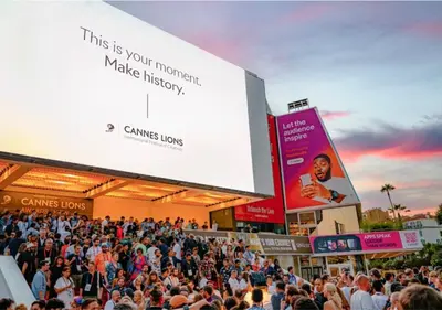 a crowd of people standing in front of a large billboard at Superb 2 Bedrooms, 1 sofabed 3P1 by RIVAEVENT in Cannes