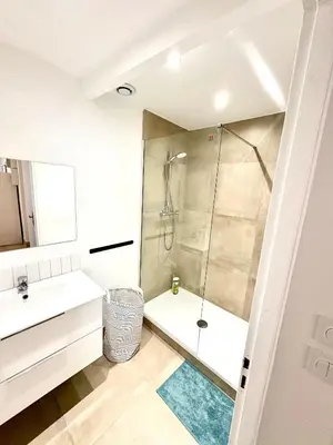 a bathroom with a shower and a sink at Villa CANA in Cannes
