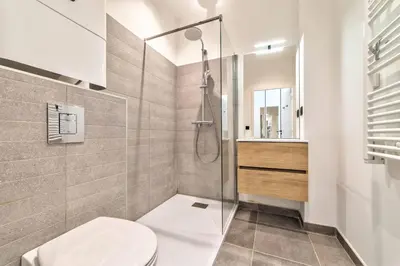 a bathroom with a toilet and a shower at Appartement Croisette Cannes centre in Cannes