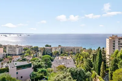 an aerial view of a city and the ocean at Appartement Wemyssia - Welkeys in Cannes