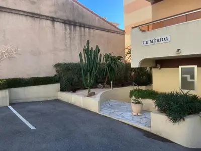 a parking lot in front of a hotel at Quartier Suquet Marché Forville 4 pers. Terrasse in Cannes