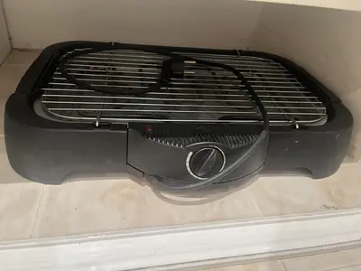 a black heater in a box on the floor at Quartier Suquet Marché Forville 4 pers. Terrasse in Cannes