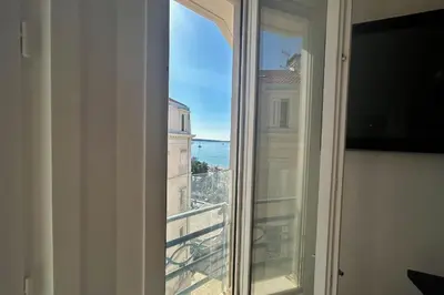 a view from a window in a room at Haven of peace overlooking the Croisette in Cannes