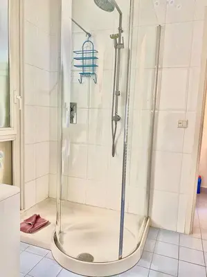 a shower with a glass door in a bathroom at Appartements Cannes 3 chambres - 8B1 in Cannes