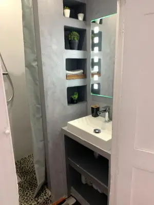 a bathroom with a sink and a mirror at THE HEART OF CANNES 5MIN BY LA CROISETTE AND BEACH in Cannes