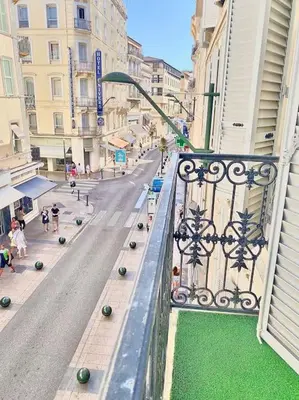 a view of a city street from a balcony at Appartement Cannes 3 chambres - 8B2 in Cannes