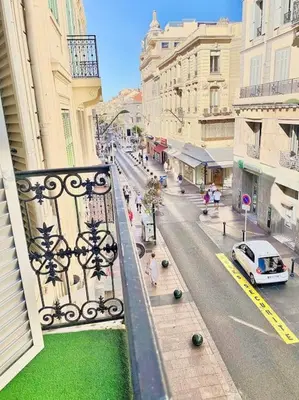 a view of a city street from a balcony at Appartement Cannes 3 chambres - 8B2 in Cannes