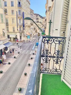 a view of a city street from a balcony at Appartement Cannes 3 chambres - 8B2 in Cannes