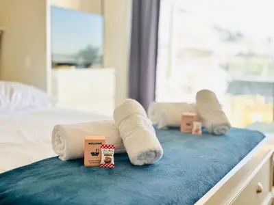 a group of rolled up towels on a bed at Le Splendide - studio croisette - vue mer in Cannes