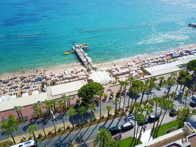 an aerial view of a beach and the ocean at CannesVacationRental by AmericanVacationLIving 1BR in Cannes