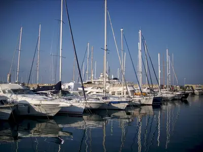 a group of boats docked in a harbor at CannesVacationRental by AmericanVacationLIving 1BR in Cannes