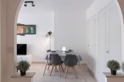 a dining room with a table and chairs at 