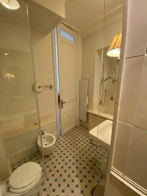 a bathroom with a toilet and a shower and a sink at ANNA CLAIRE festival plages GAZ5213 in Cannes