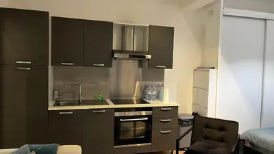 a kitchen with a sink and a stove at Appartment Cannes City Centre in Cannes