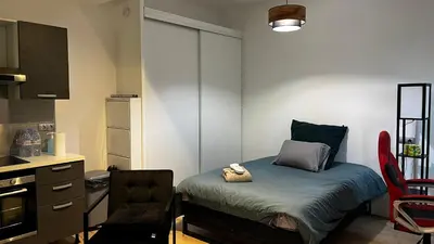 a bathroom with a sink and a toilet and a mirror at Appartment Cannes City Centre in Cannes