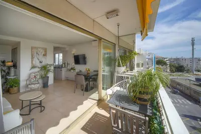 an apartment balcony with a view of a living room at FRGK 