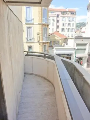 a walkway leading down to a building in a city at GRAY 2a7 in Cannes