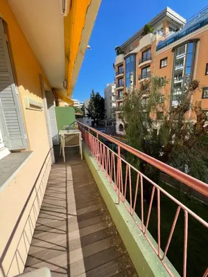 a balcony of a apartment building with a railing at Renovated Cannes Centre Banane balcon in Cannes