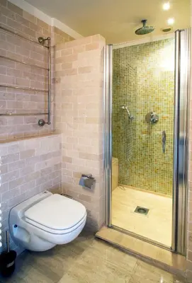 a bathroom with a toilet and a shower at T3 vue mer LE MACE PLAGE in Cannes