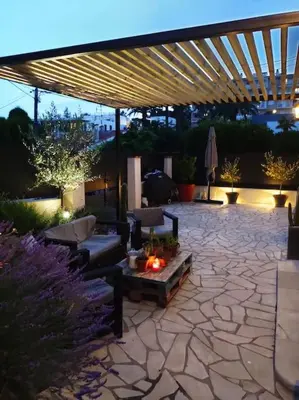 a patio with a couch and a table on a patio at FRGK