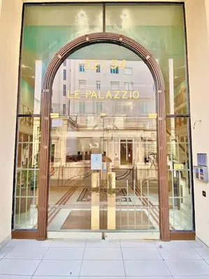 an entrance to a building with a large glass door at Appartement Canne 1 chambre - 52C in Cannes