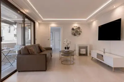 a living room with a couch and a tv at 